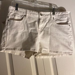 All white jean shorts.